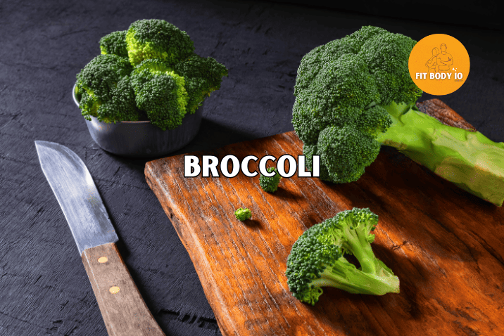 A close-up view of a fresh broccoli floret, showcasing its intricate, densely packed emerald buds and vibrant green color